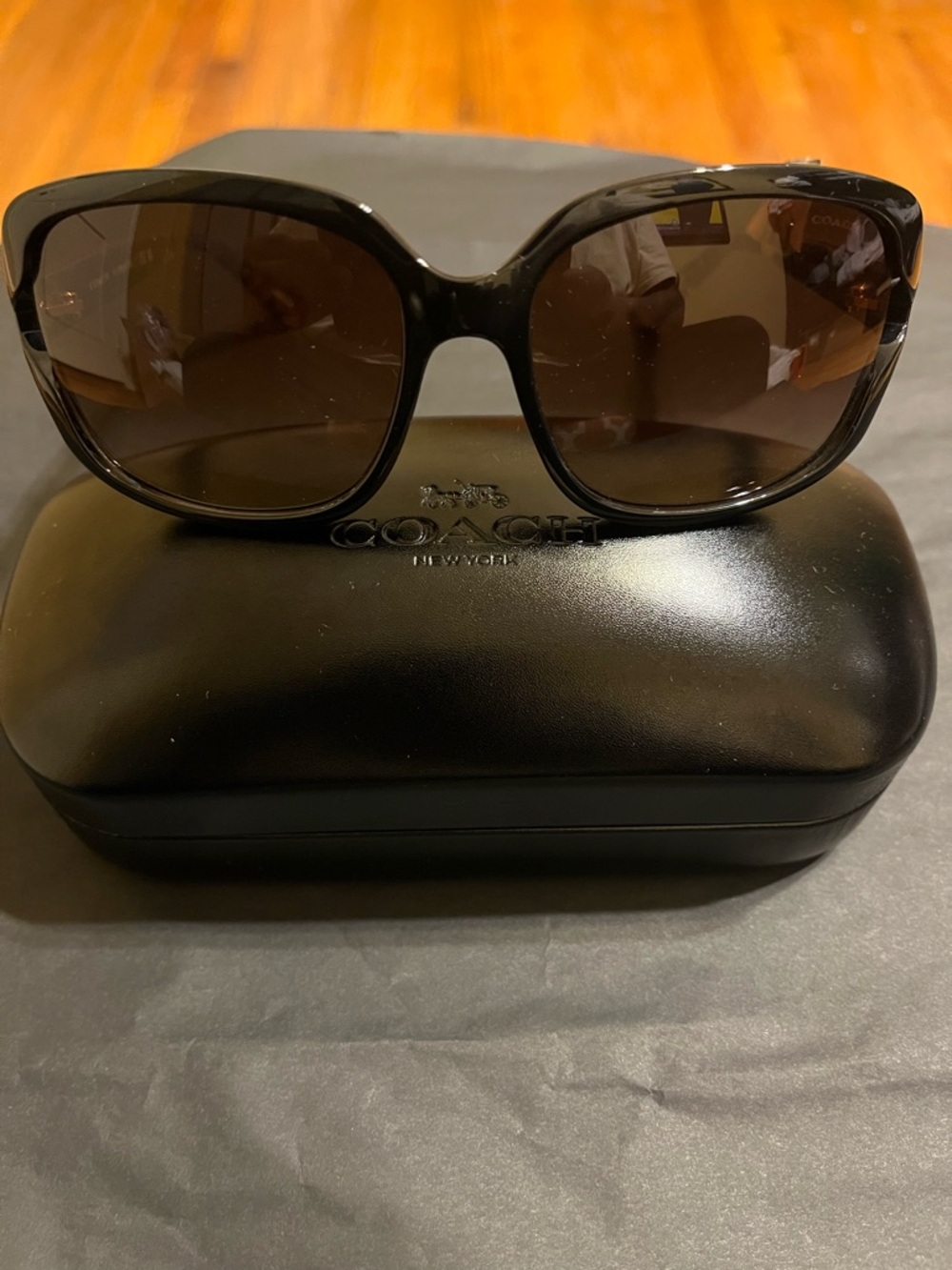 Coach Women's Black Frame Sunglasses with Brown Gradient Lenses